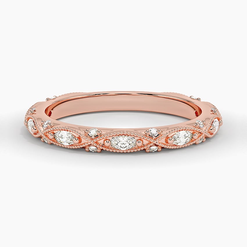 Rose gold diamond engagement ring with surprise diamond details