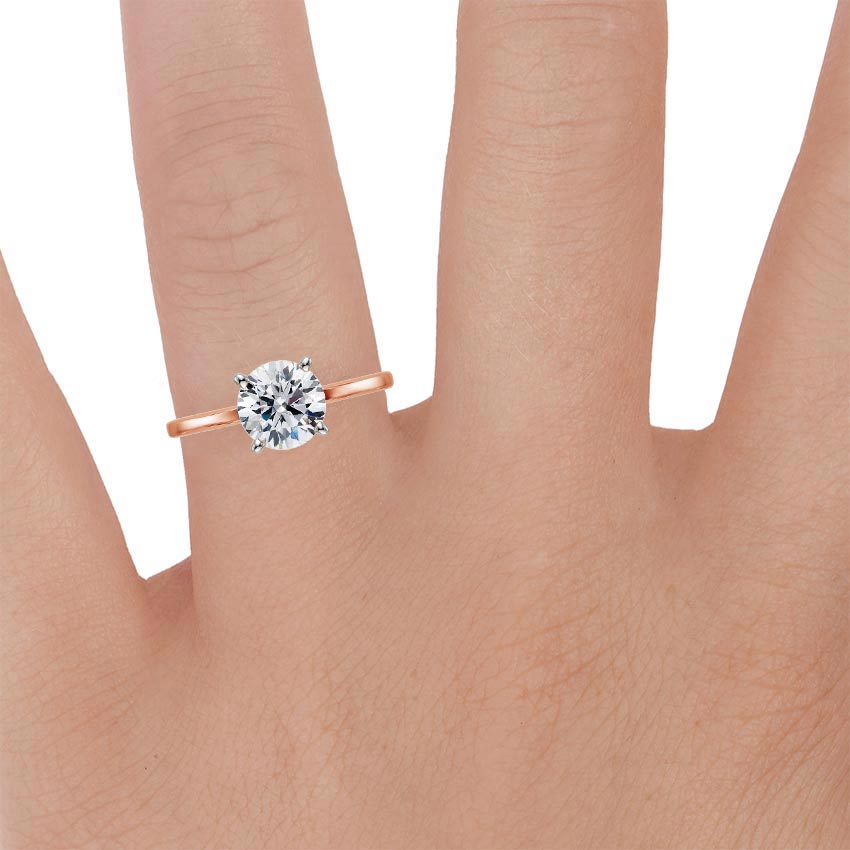 14K Rose Gold Petite Quattro Solitaire Ring, large zoomed in top view on a hand