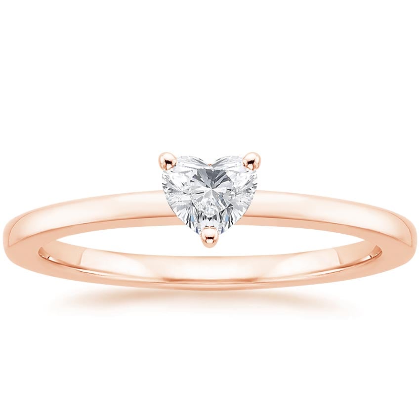 Rose gold diamond engagement ring with surprise diamond details