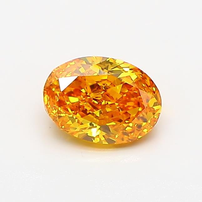 0.71 Ct. Fancy Vivid Orangy Yellow Oval Lab Grown Diamond