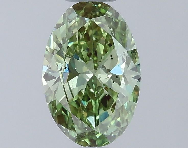 0.59 Ct. Fancy Vivid Green Oval Lab Grown Diamond