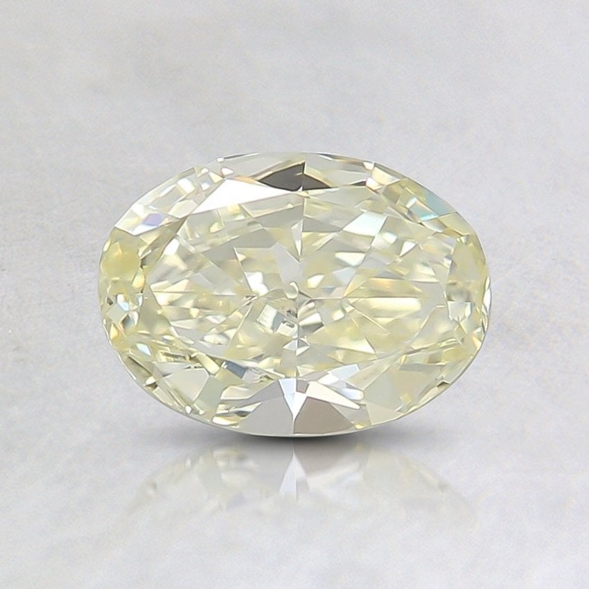 0.61 Ct. Fancy Yellow Oval Diamond