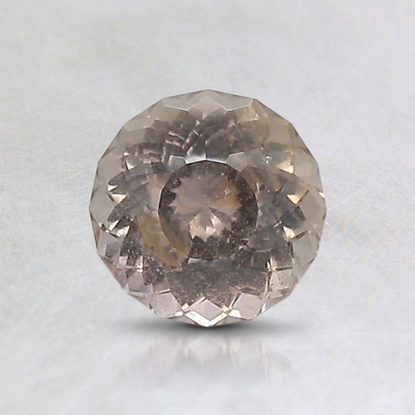 5.8mm Unheated Peach Modified Round Tanzanian Sapphire