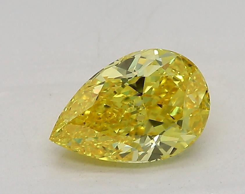 0.99 Ct. Fancy Vivid Yellow Pear Lab Grown Diamond