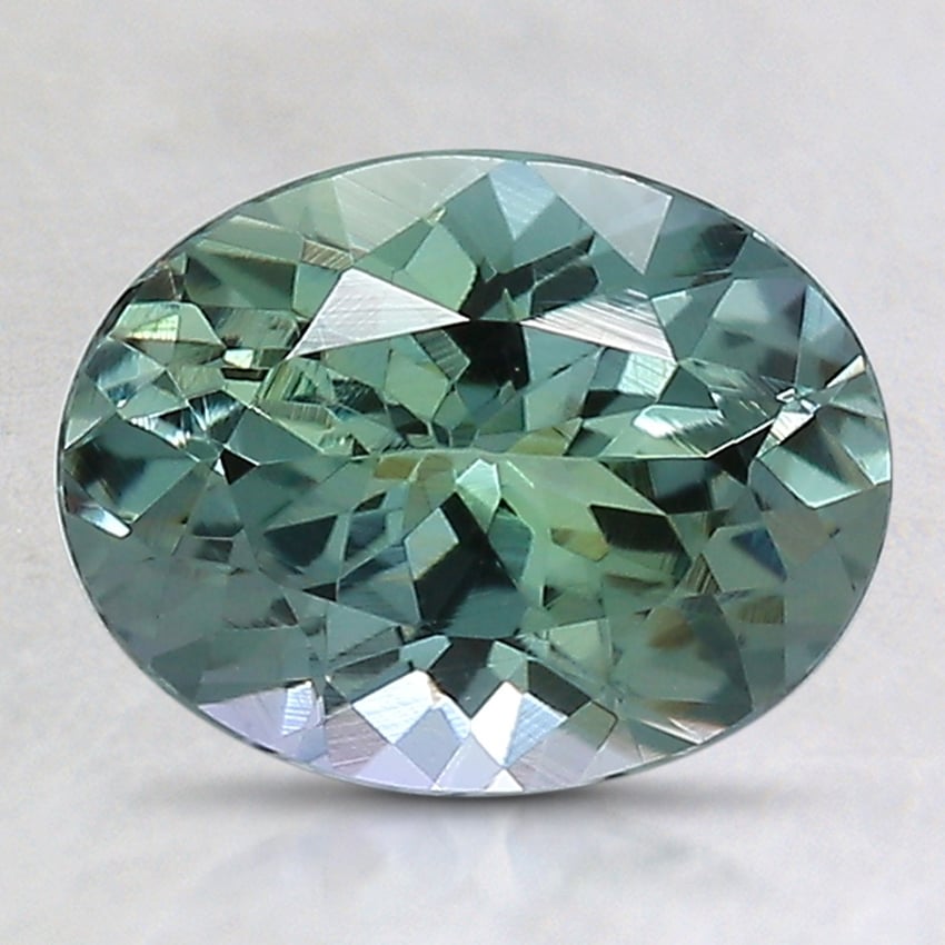 9x7mm Unheated Parti-Color Oval Tanzanite