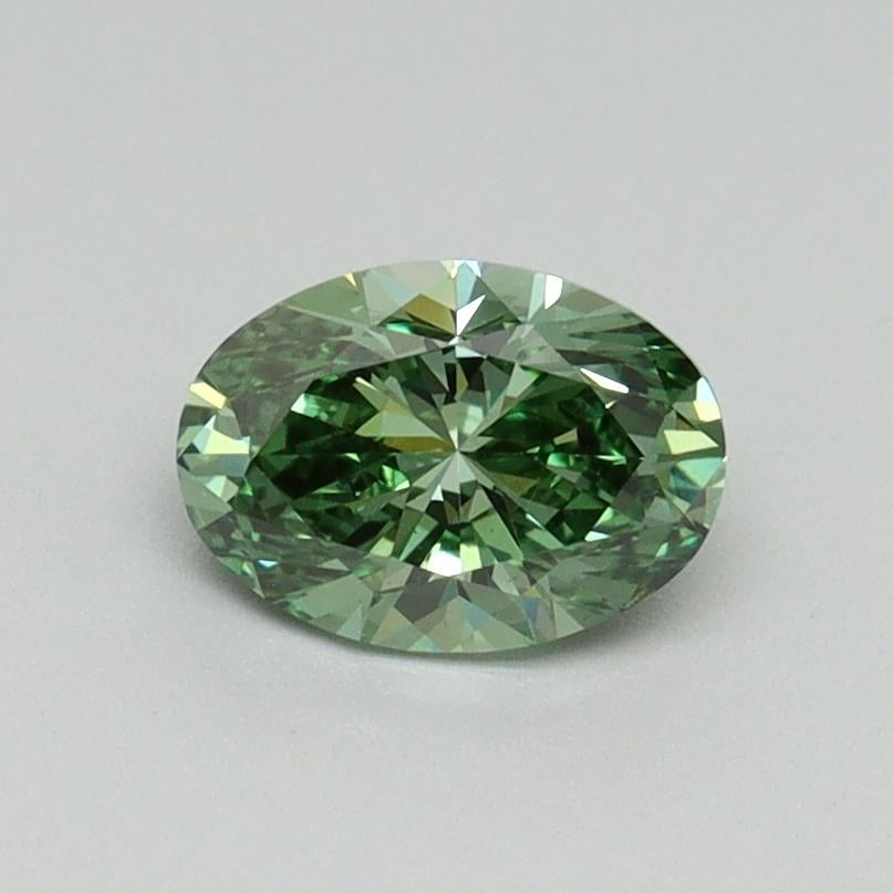 0.71 Ct. Fancy Vivid Green Oval Lab Grown Diamond