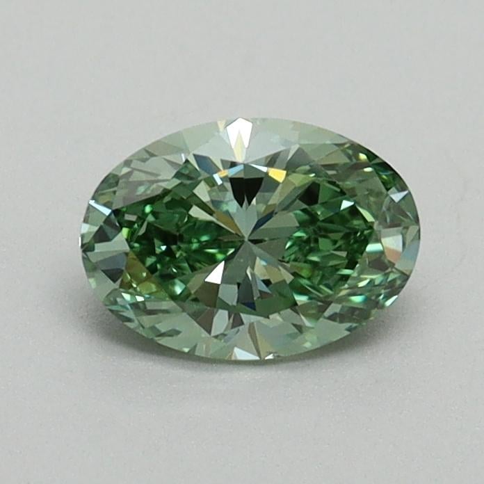 0.59 Ct. Fancy Vivid Pacific Green Oval Lab Grown Diamond