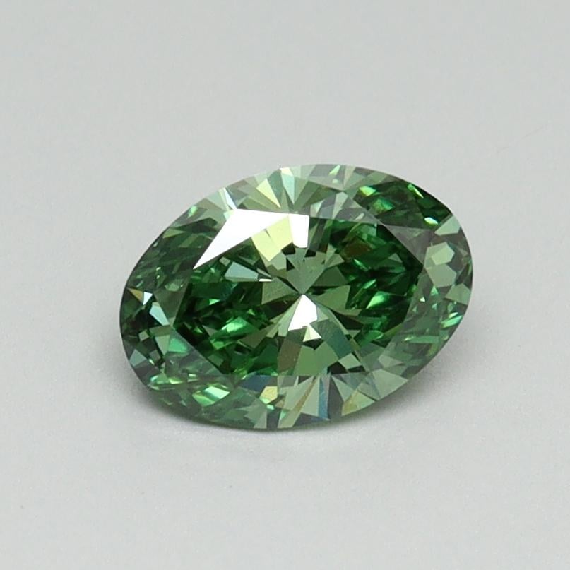 0.62 Ct. Fancy Vivid Green Oval Lab Grown Diamond