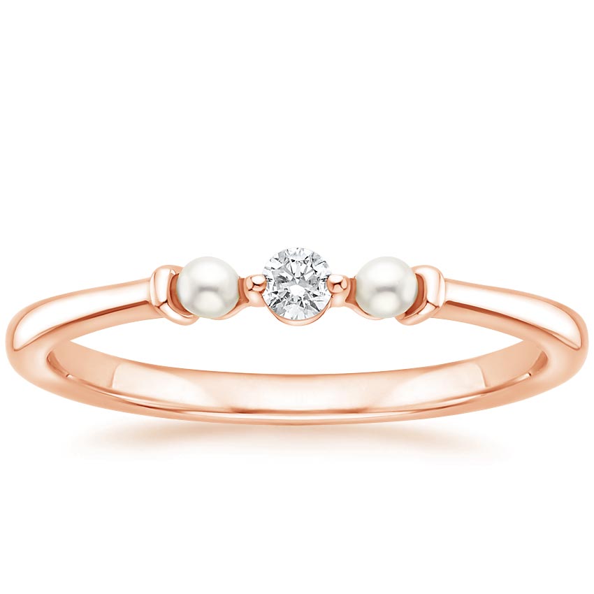 Rose gold diamond engagement ring with surprise diamond details
