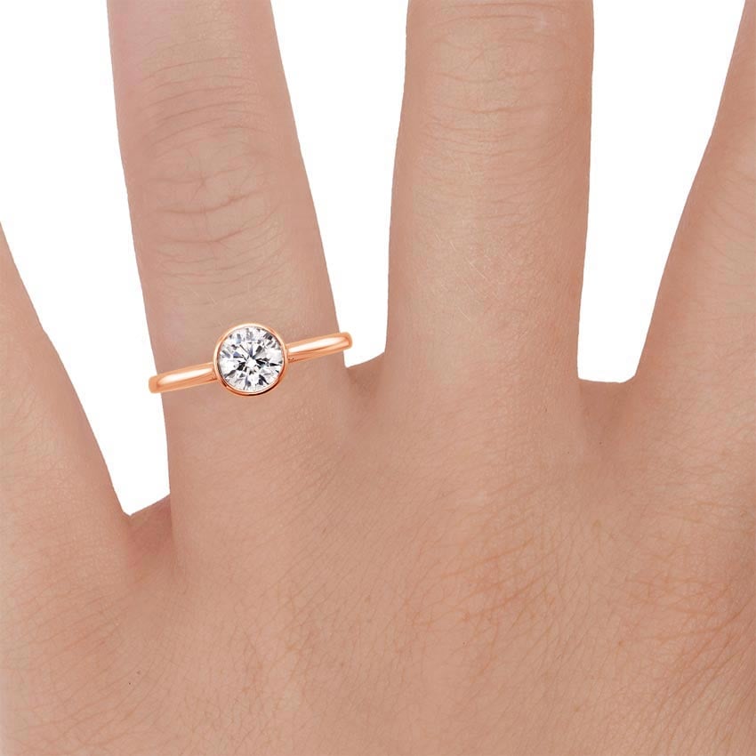 14K Rose Gold Luna 2mm Bezel Ring, large zoomed in top view on a hand