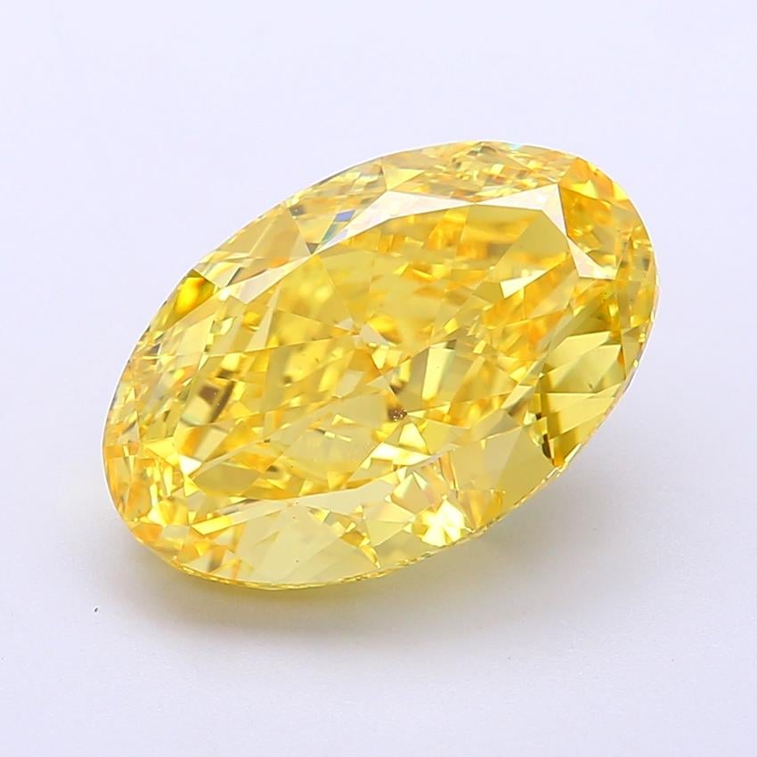 6.11 Ct. Fancy Vivid  Yellow Oval Lab Grown Diamond