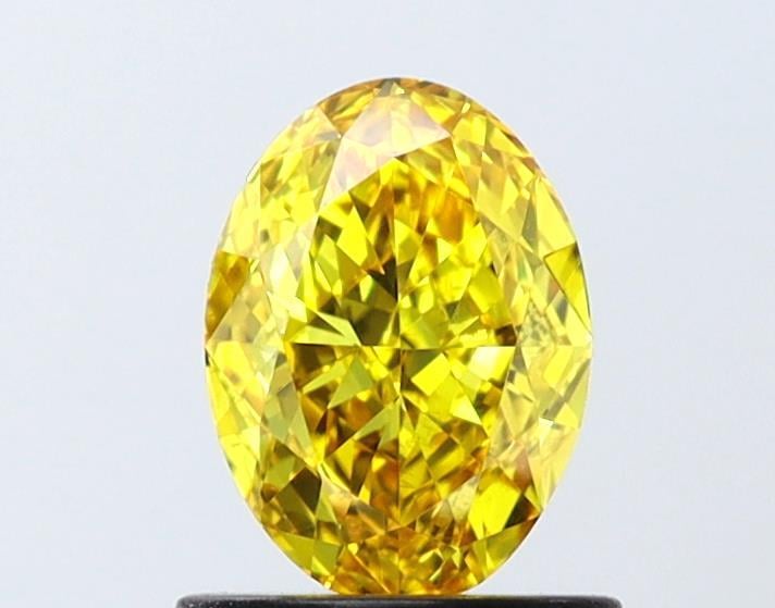 0.91 Ct. Fancy Vivid  Yellow Oval Lab Grown Diamond