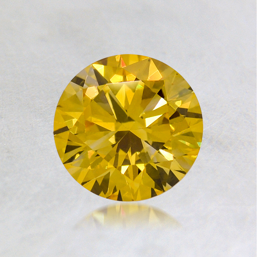 0.74 ct. Lab Grown Fancy Vivid Yellow Round Diamond
