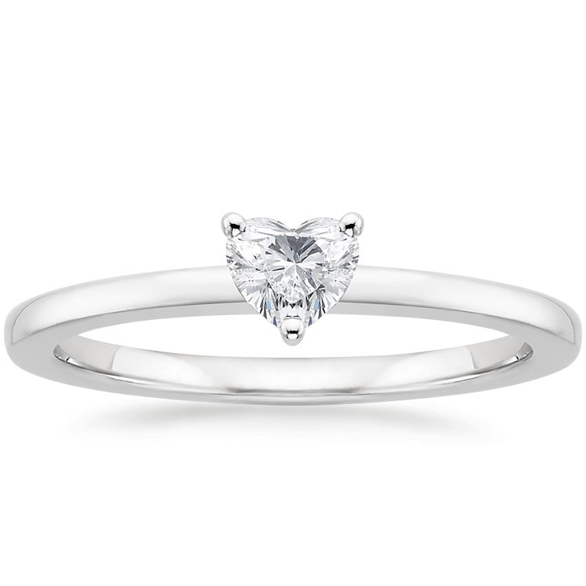 Rose gold diamond engagement ring with surprise diamond details