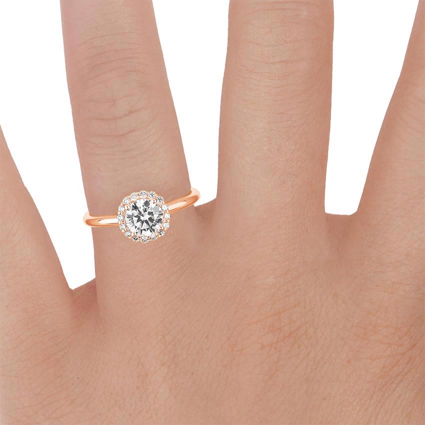 14K Rose Gold Halo Diamond Ring (1/6 ct. tw.), large zoomed in top view on a hand