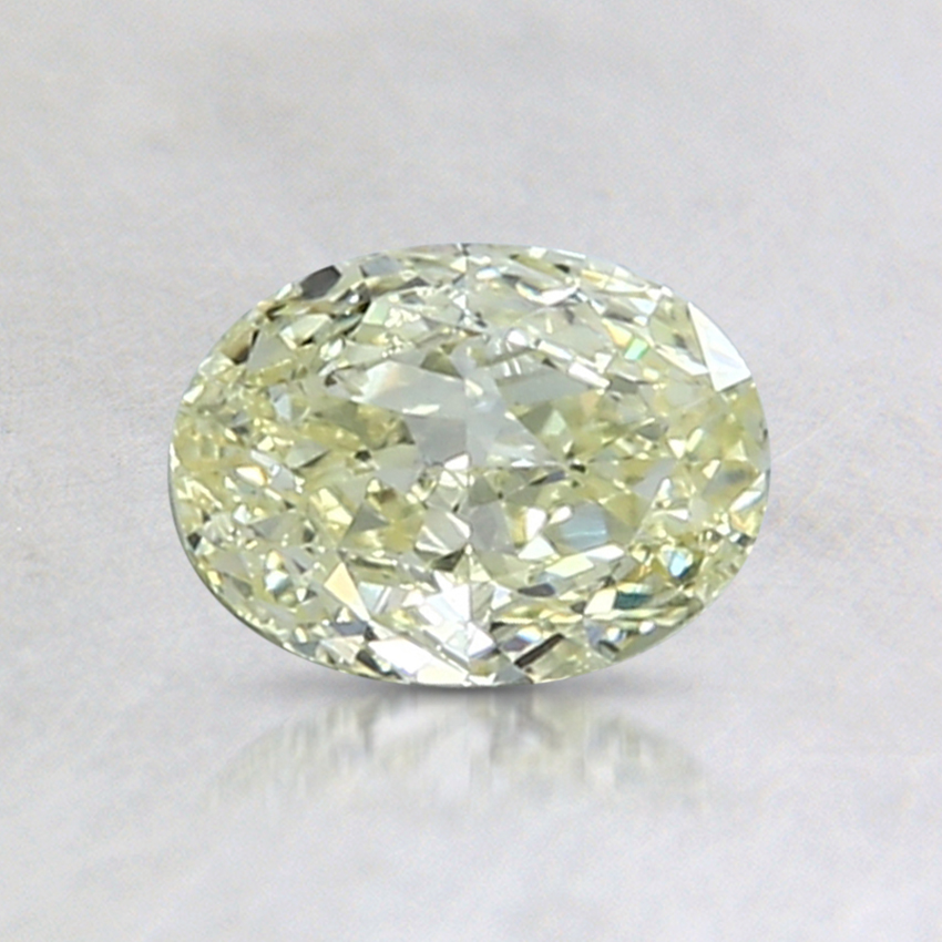 0.62 Ct. Fancy Yellow Oval Diamond