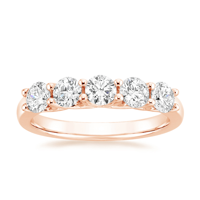 Rose gold diamond engagement ring with surprise diamond details