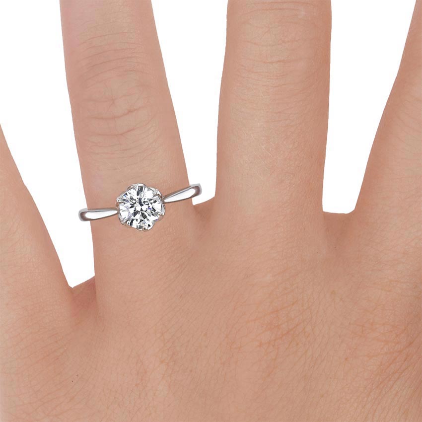 Platinum Caliana Ring, large zoomed in top view on a hand
