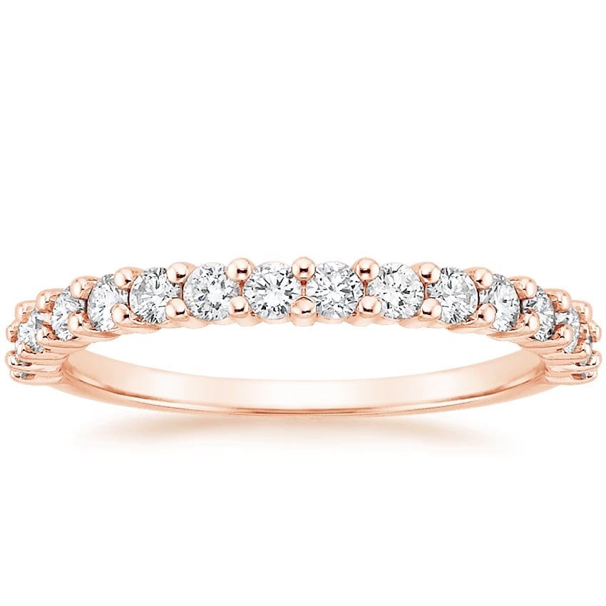 Rose gold diamond engagement ring with surprise diamond details