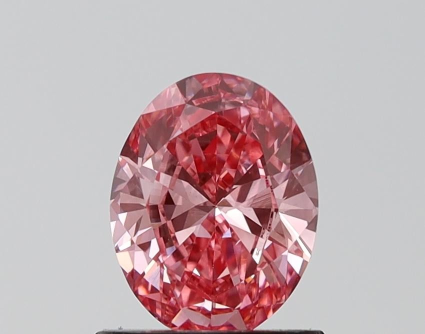1.11 Ct. Fancy Vivid Pink Oval Lab Grown Diamond