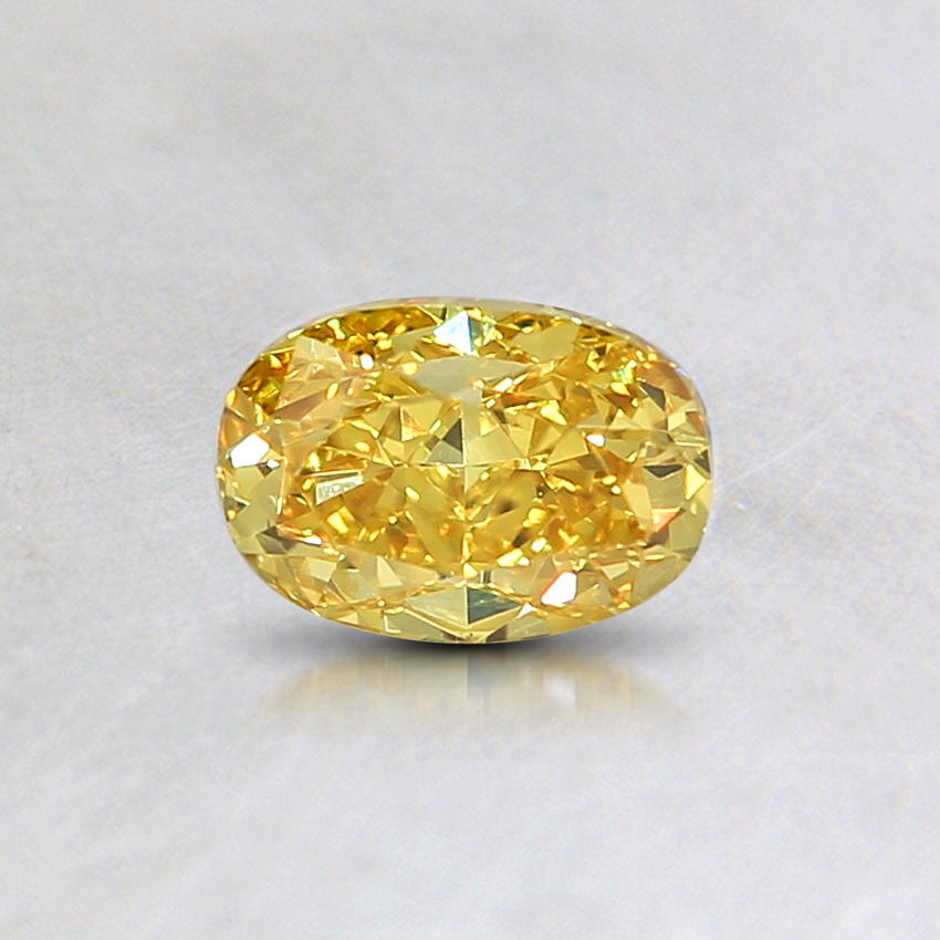 0.52 Ct. Natural Fancy Vivid Orangy Yellow Oval Diamond