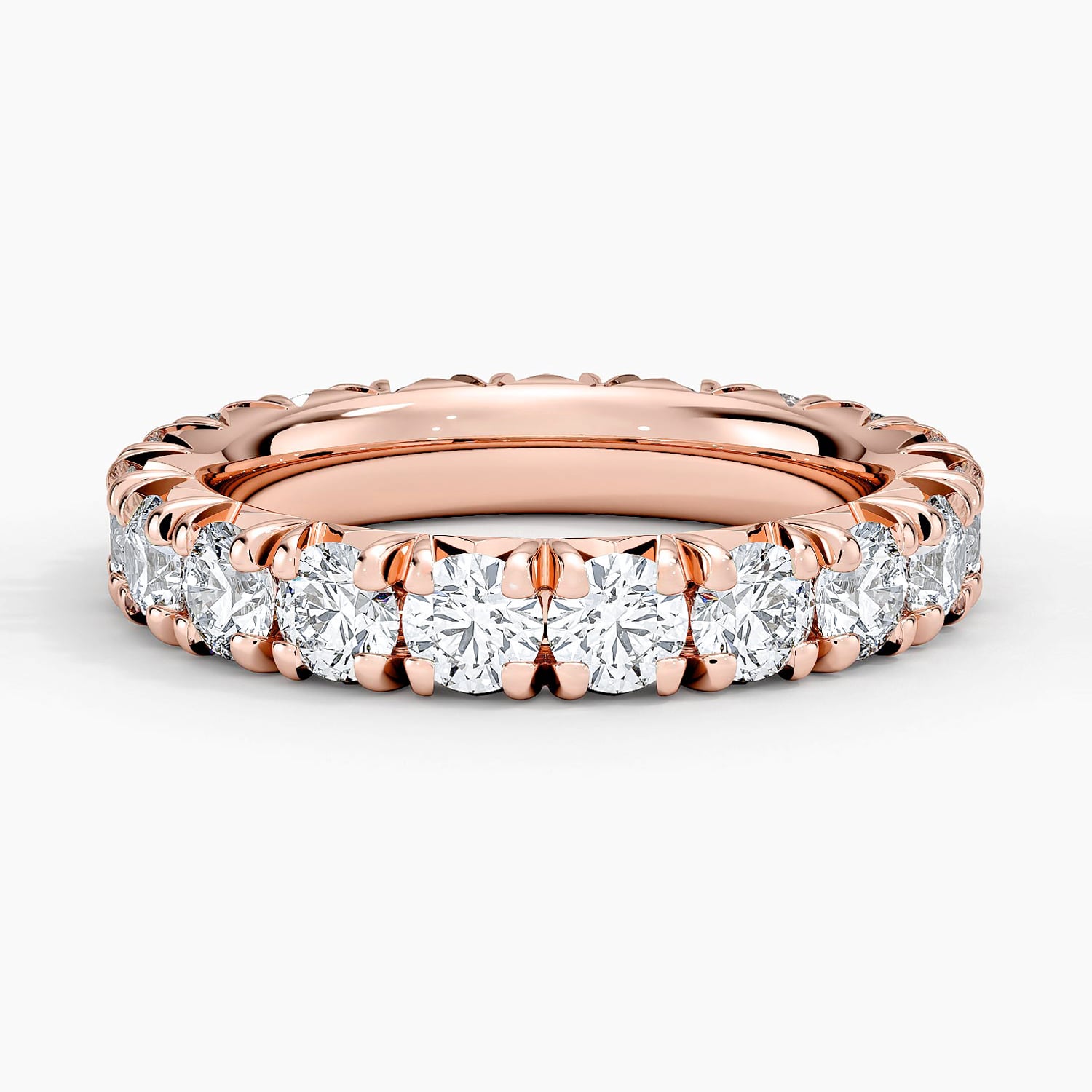 Rose gold diamond engagement ring with surprise diamond details