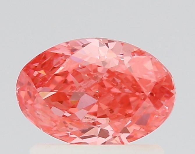 0.78 Ct. Fancy Vivid Pink Oval Lab Grown Diamond