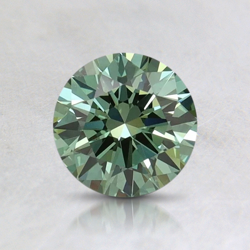 0.72 Ct. Fancy Vivid Pacific Green Round Lab Grown Diamond