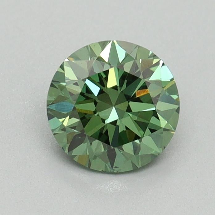 0.74 Ct. Fancy Vivid Pacific Green Round Lab Grown Diamond