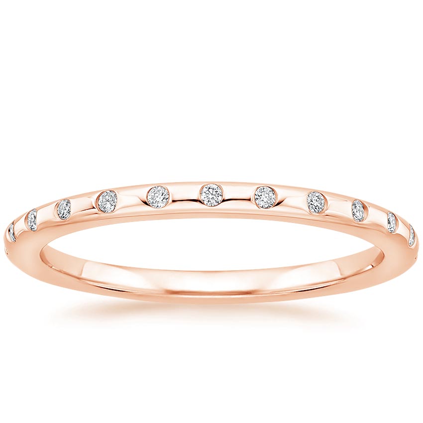 Rose gold diamond engagement ring with surprise diamond details