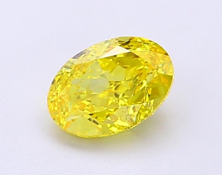 1.1 Ct. Fancy Vivid Yellow Oval Lab Grown Diamond