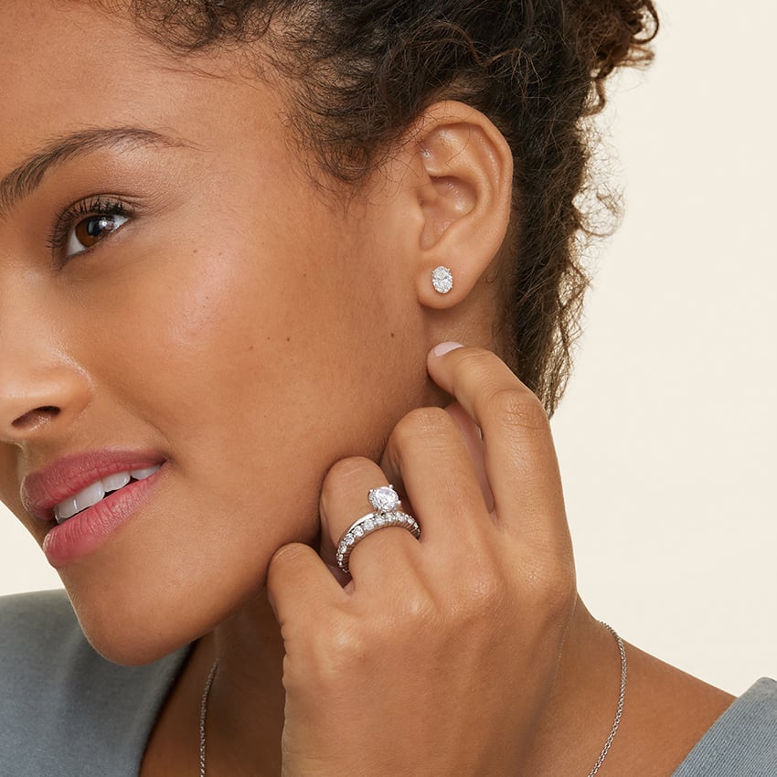 Four-Prong Oval Diamond Stud Earrings in 18K White Gold