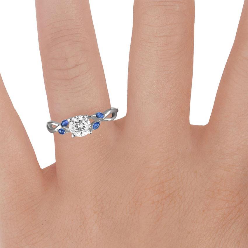 18K White Gold Willow Ring With Sapphire Accents, large zoomed in top view on a hand
