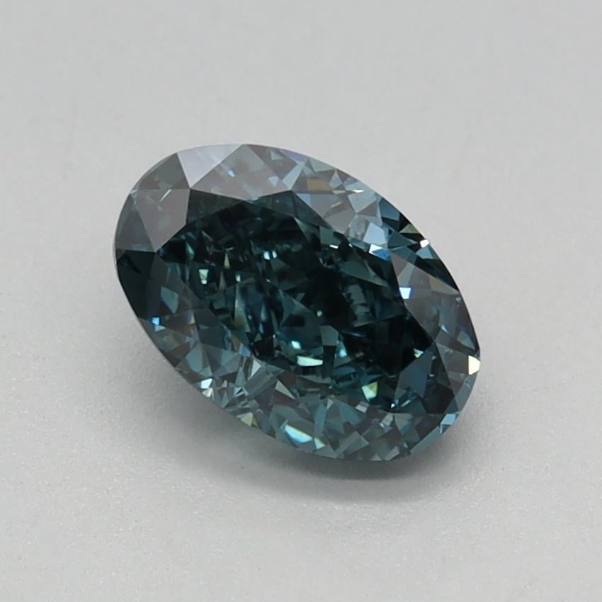 0.78 Ct. Fancy Vivid Bluish Green Oval Lab Grown Diamond