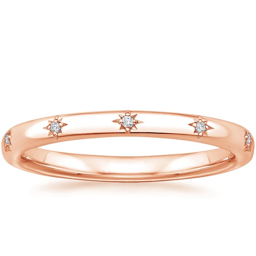 Rose gold diamond engagement ring with surprise diamond details