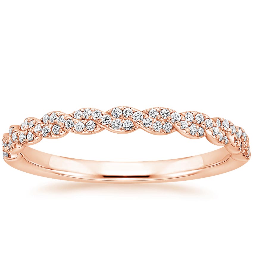 Rose gold diamond engagement ring with surprise diamond details