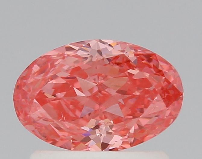 0.79 Ct. Fancy Vivid Pink Oval Lab Grown Diamond