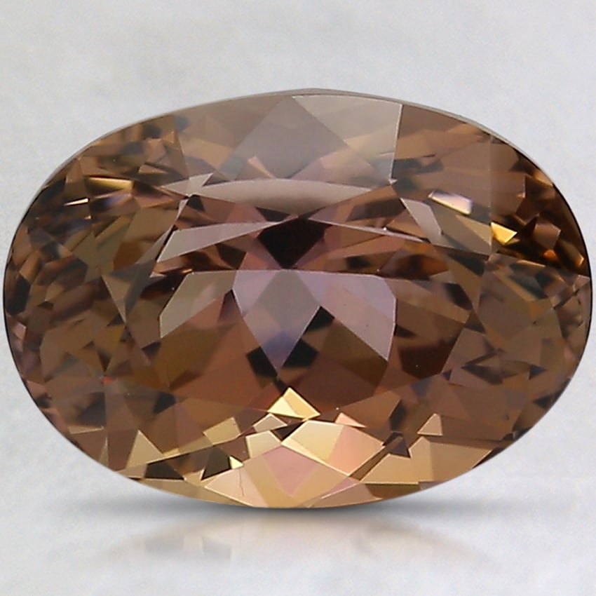 10.8x7.7mm Parti-Color Oval Tanzanite