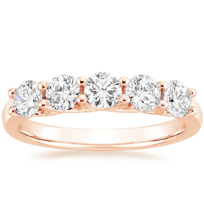 Rose gold diamond engagement ring with surprise diamond details