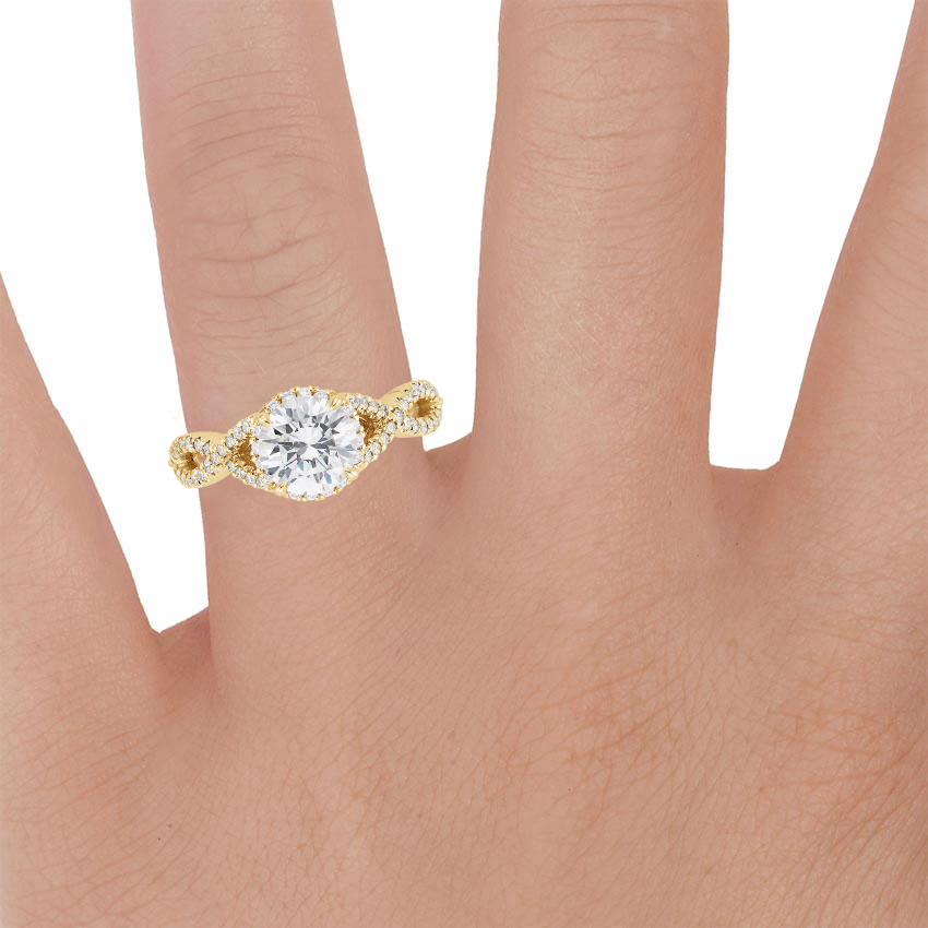 18K Yellow Gold Entwined Halo Diamond Ring (1/3 ct. tw.), large zoomed in top view on a hand