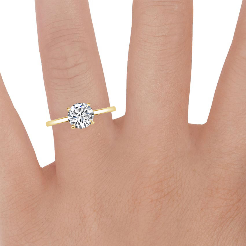 18K Yellow Gold Audrey Perfect Fit 1.4mm Solitaire Ring, large zoomed in top view on a hand