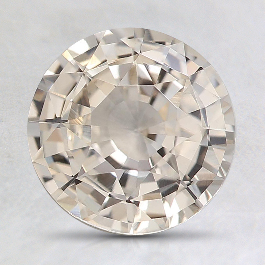 7.9mm Unheated Peach Round Sapphire