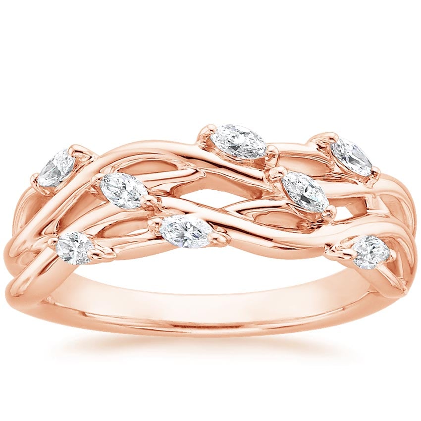 Rose gold diamond engagement ring with surprise diamond details