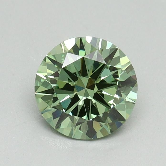 0.71 Ct. Fancy Vivid Pacific Green Round Lab Grown Diamond