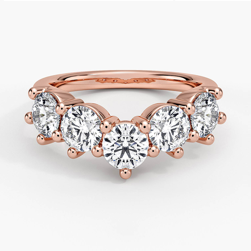 Rose gold diamond engagement ring with surprise diamond details