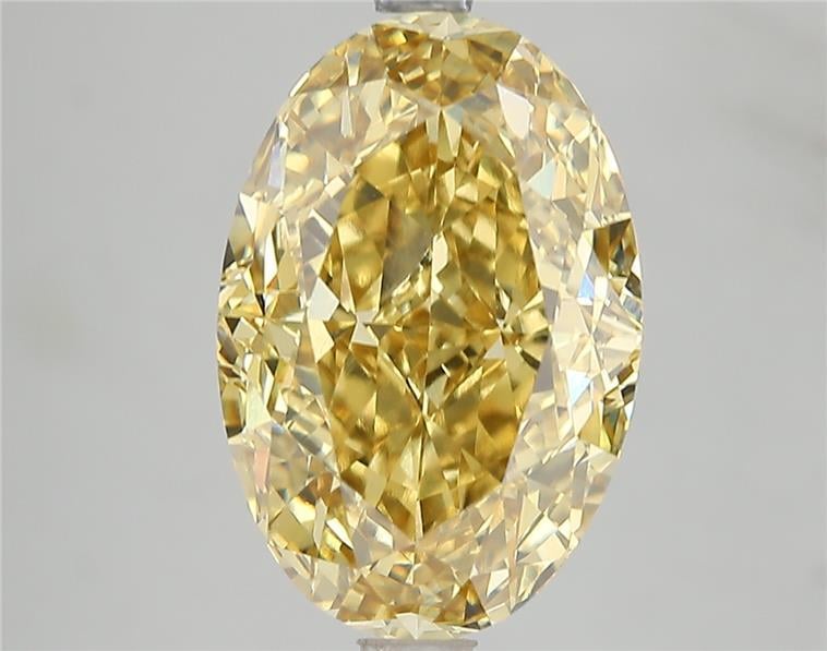 6.15 Ct. Fancy Vivid Yellow Oval Lab Grown Diamond