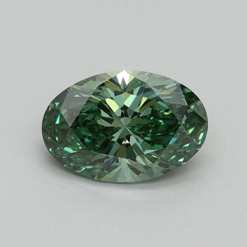 0.73 Ct. Fancy Vivid Green Oval Lab Grown Diamond