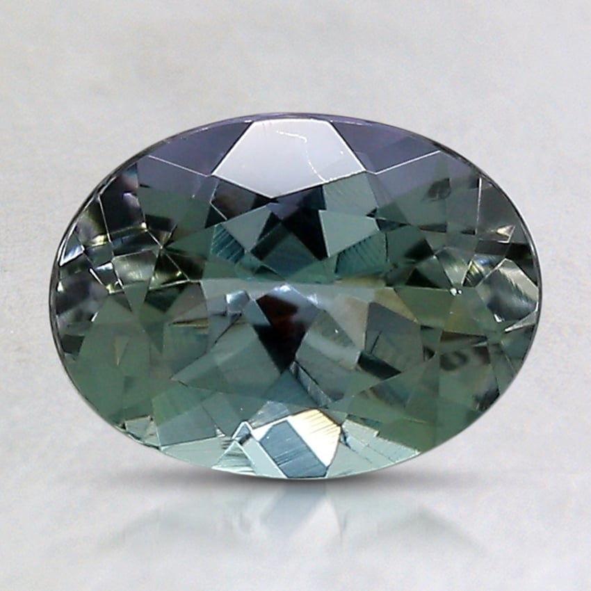 8.5x6.4mm Unheated Parti-Color Oval Tanzanite