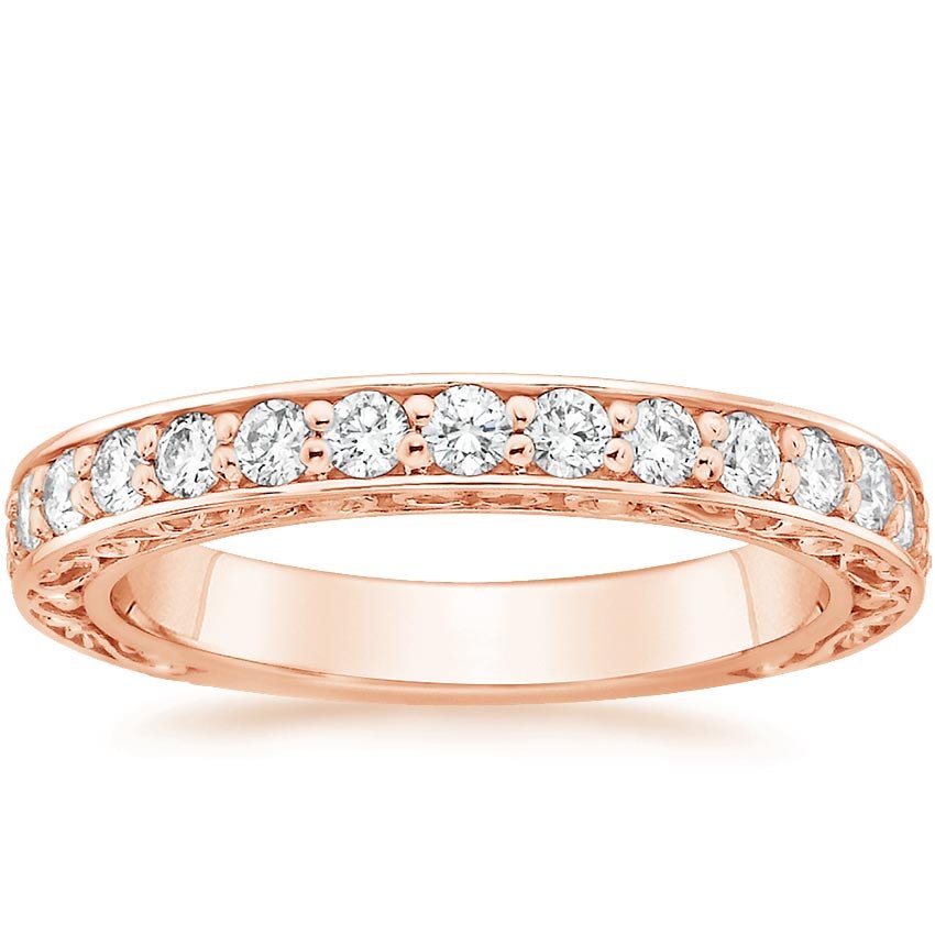 Rose gold diamond engagement ring with surprise diamond details
