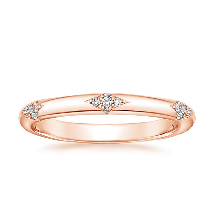 Rose gold diamond engagement ring with surprise diamond details